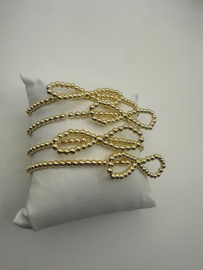 jennifer thames bow beaded bracelet in gold