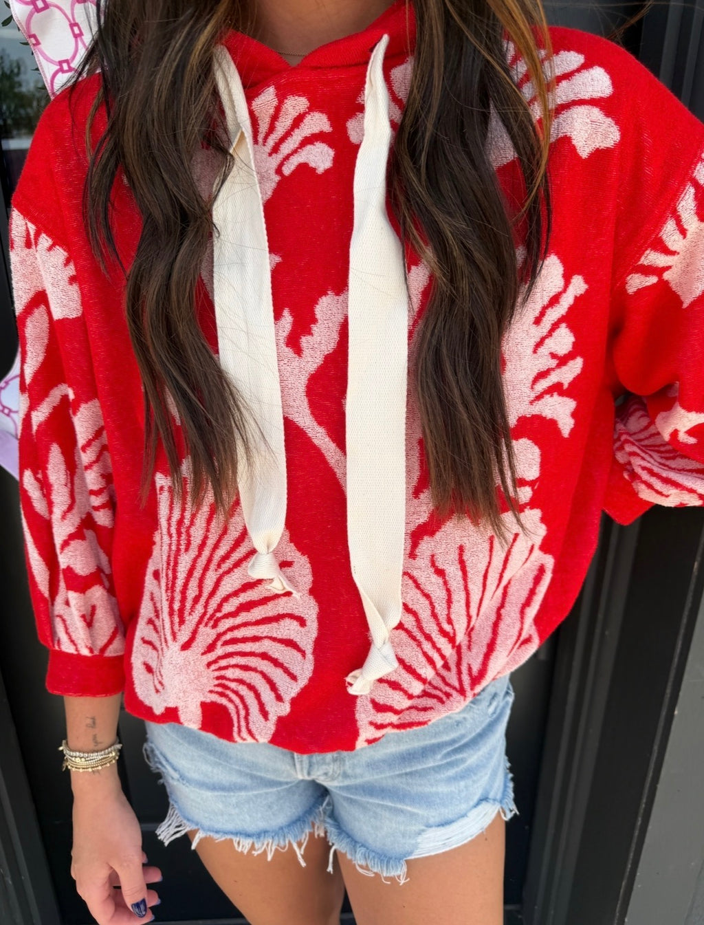 free people shell baby hoodie in cherry combo