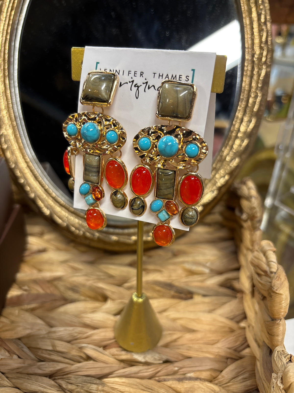 jennifer thames orange and tura earring