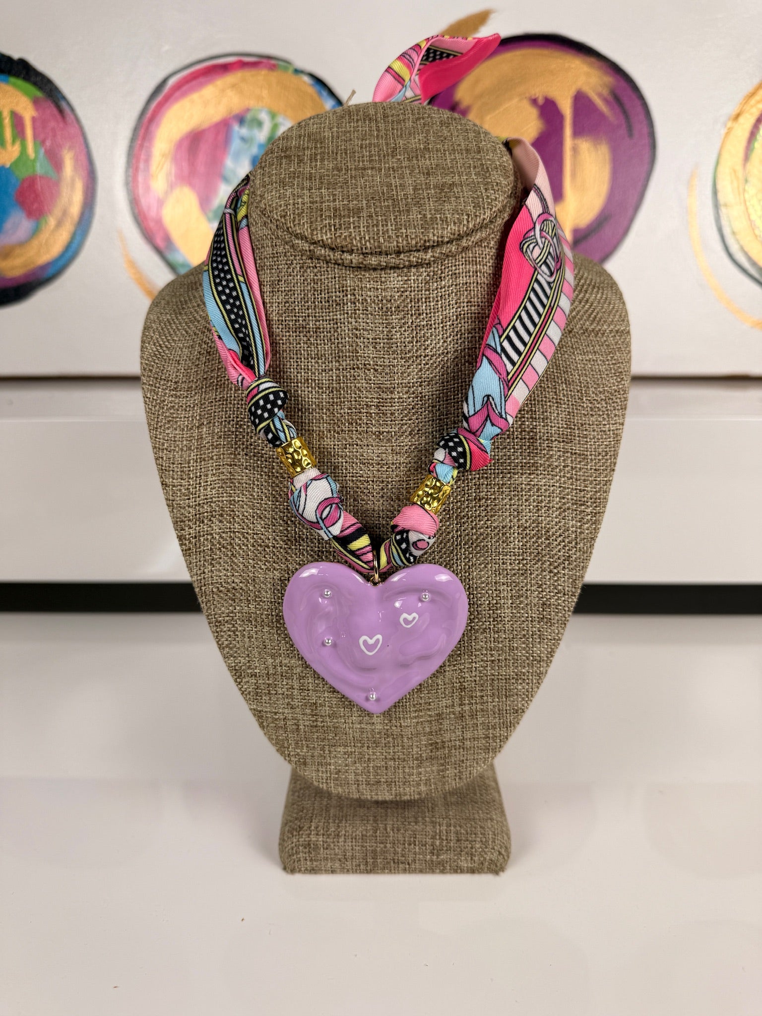jennifer thames scarf with pink heart pendant