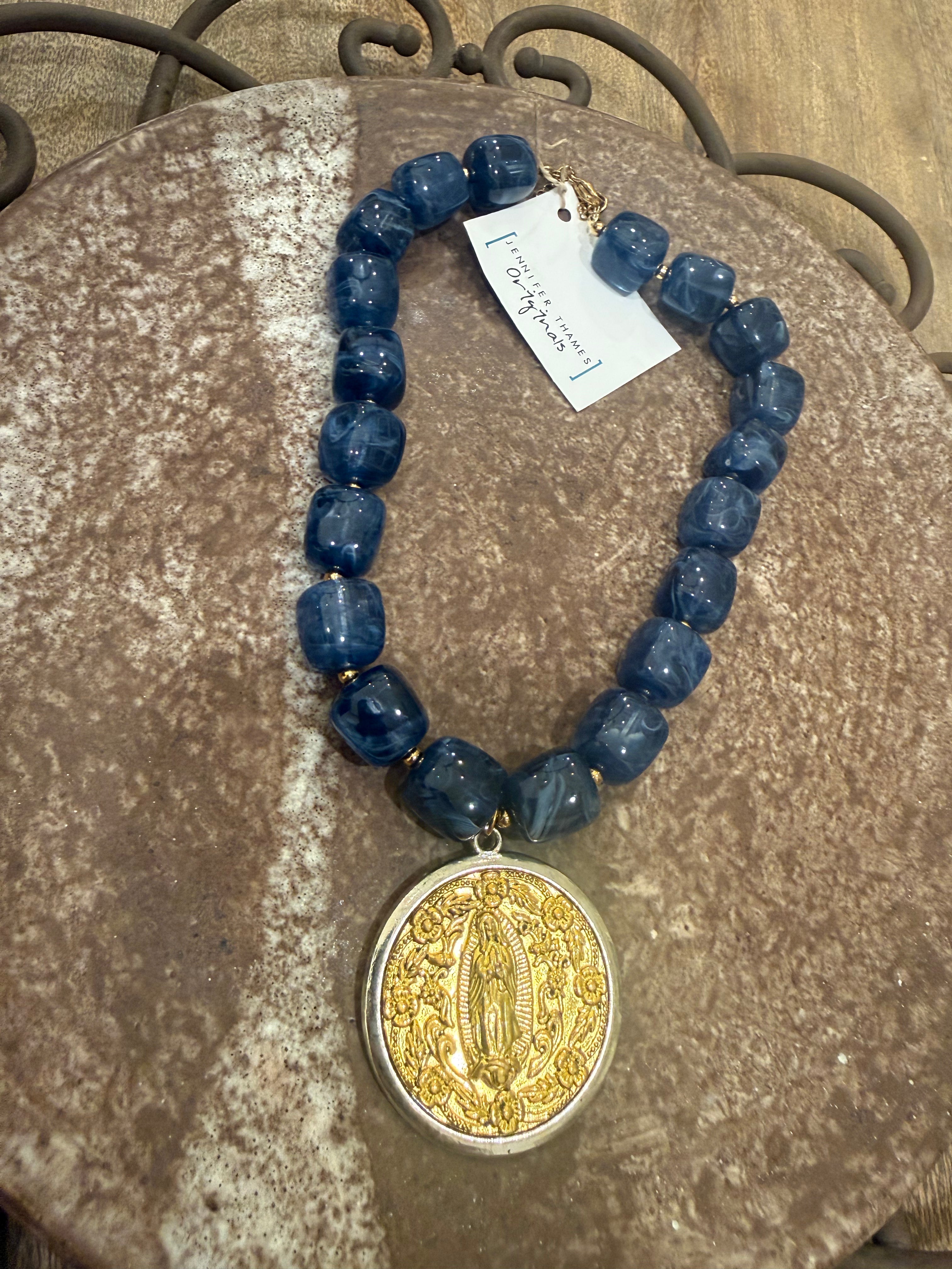 jennifer thames holy necklace