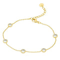 aubrey adele daimond bezel bracelet in gold