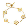 aubrey adele french cross bracelet in gold
