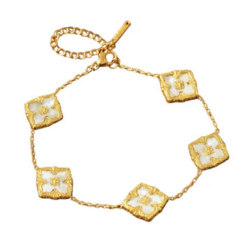 aubrey adele french cross bracelet in gold